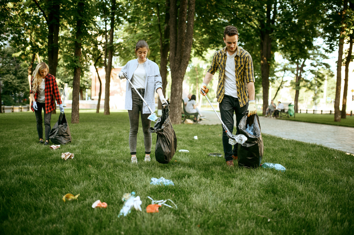 Young People Collects Trash in Park, Volunteering
